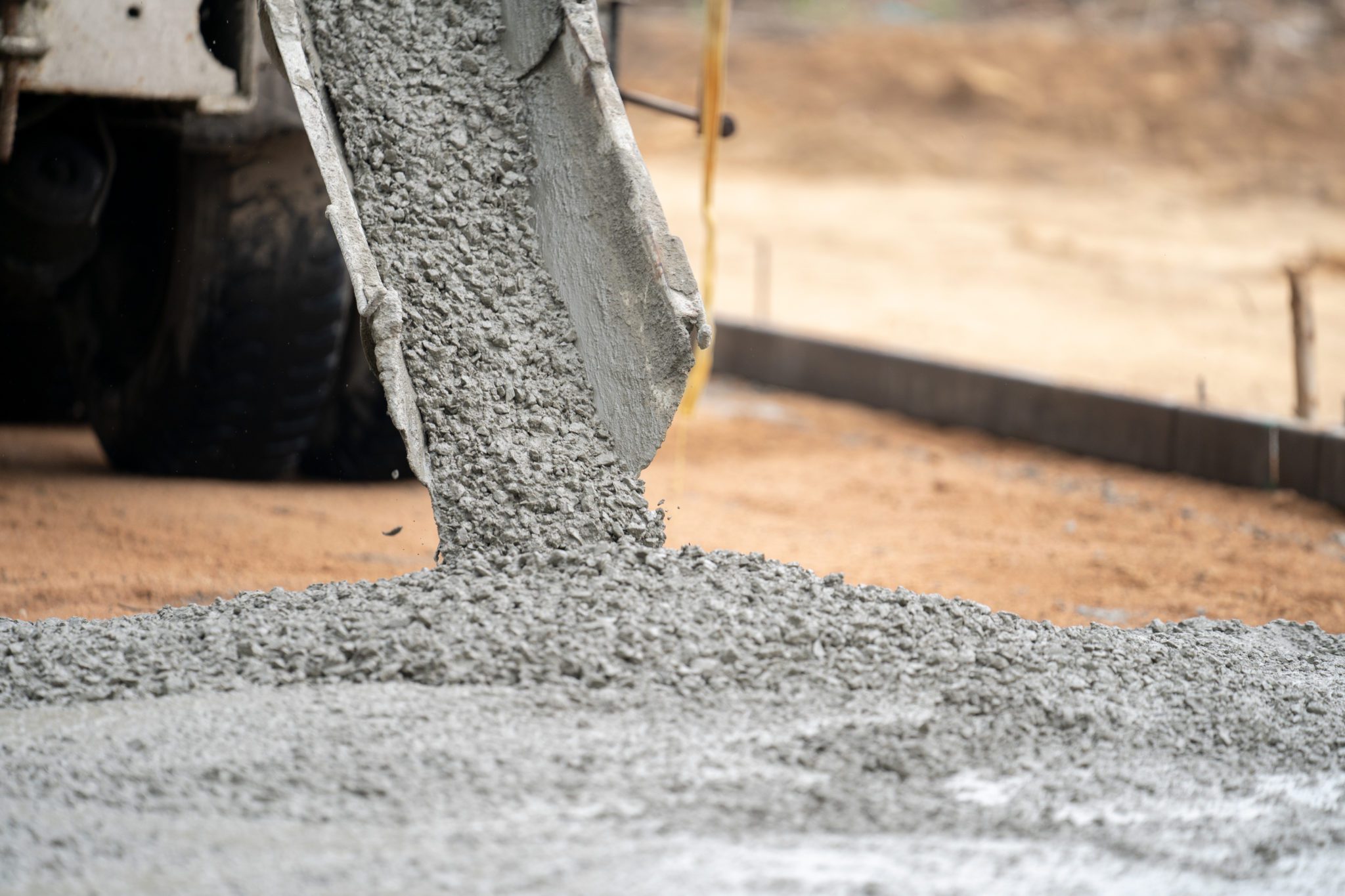 construction-worker-pouring-wet-concret-road-construction-site (2)