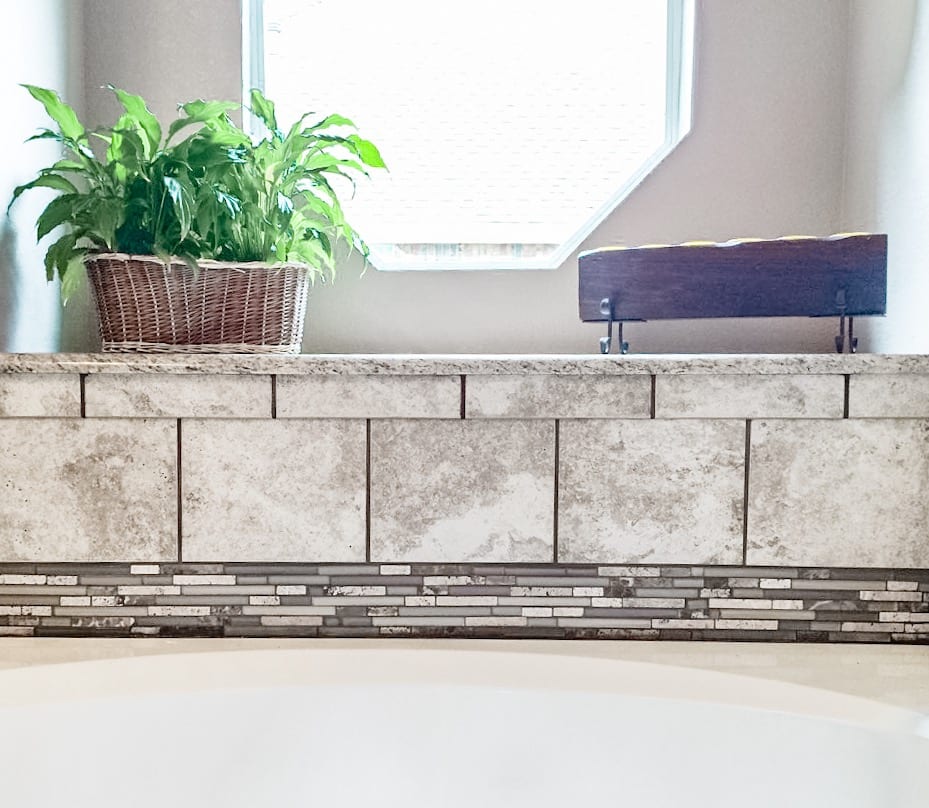 bathtub grey tile backsplash