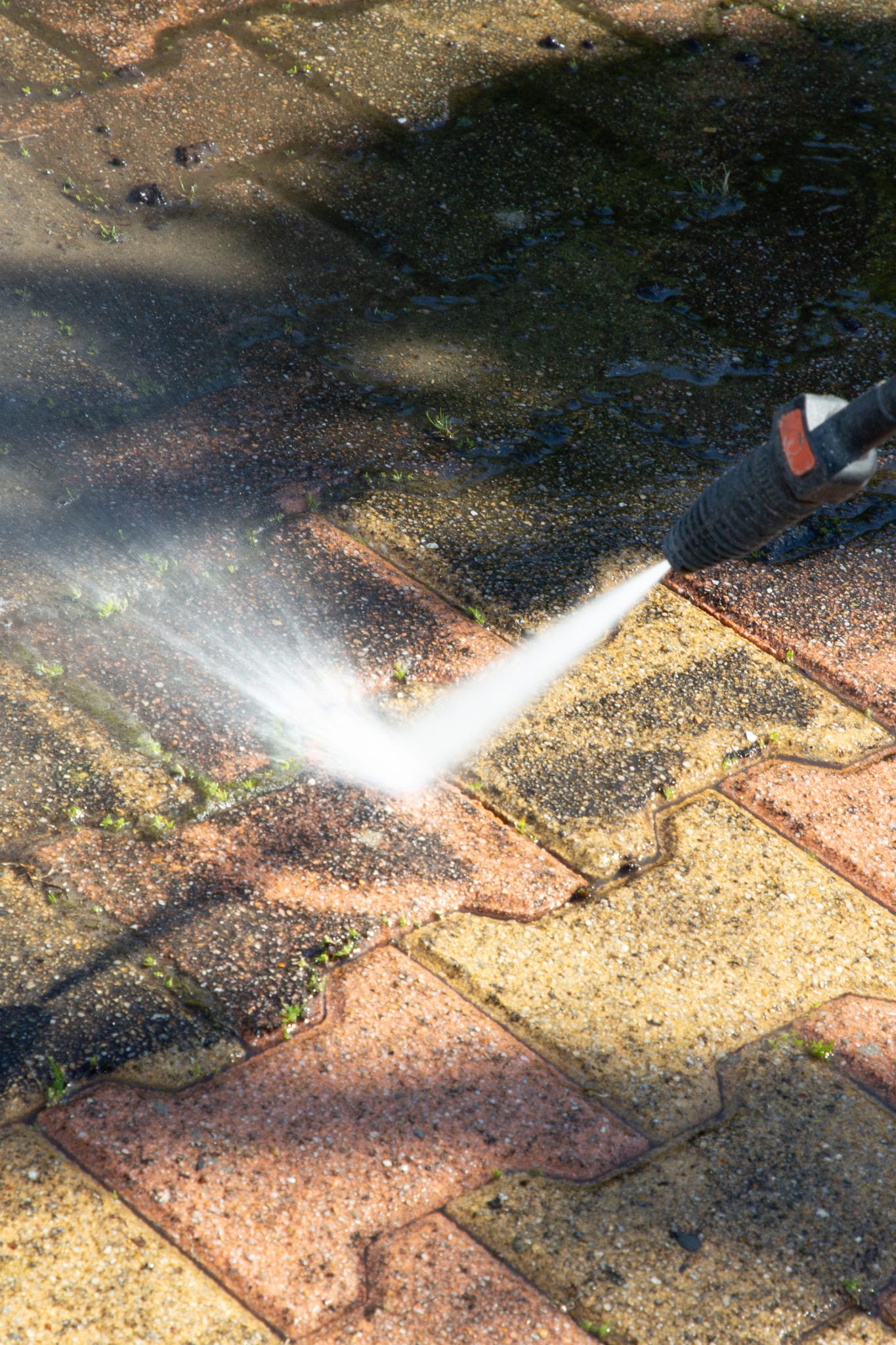 Outdoor floor cleaning with high pressure water jet