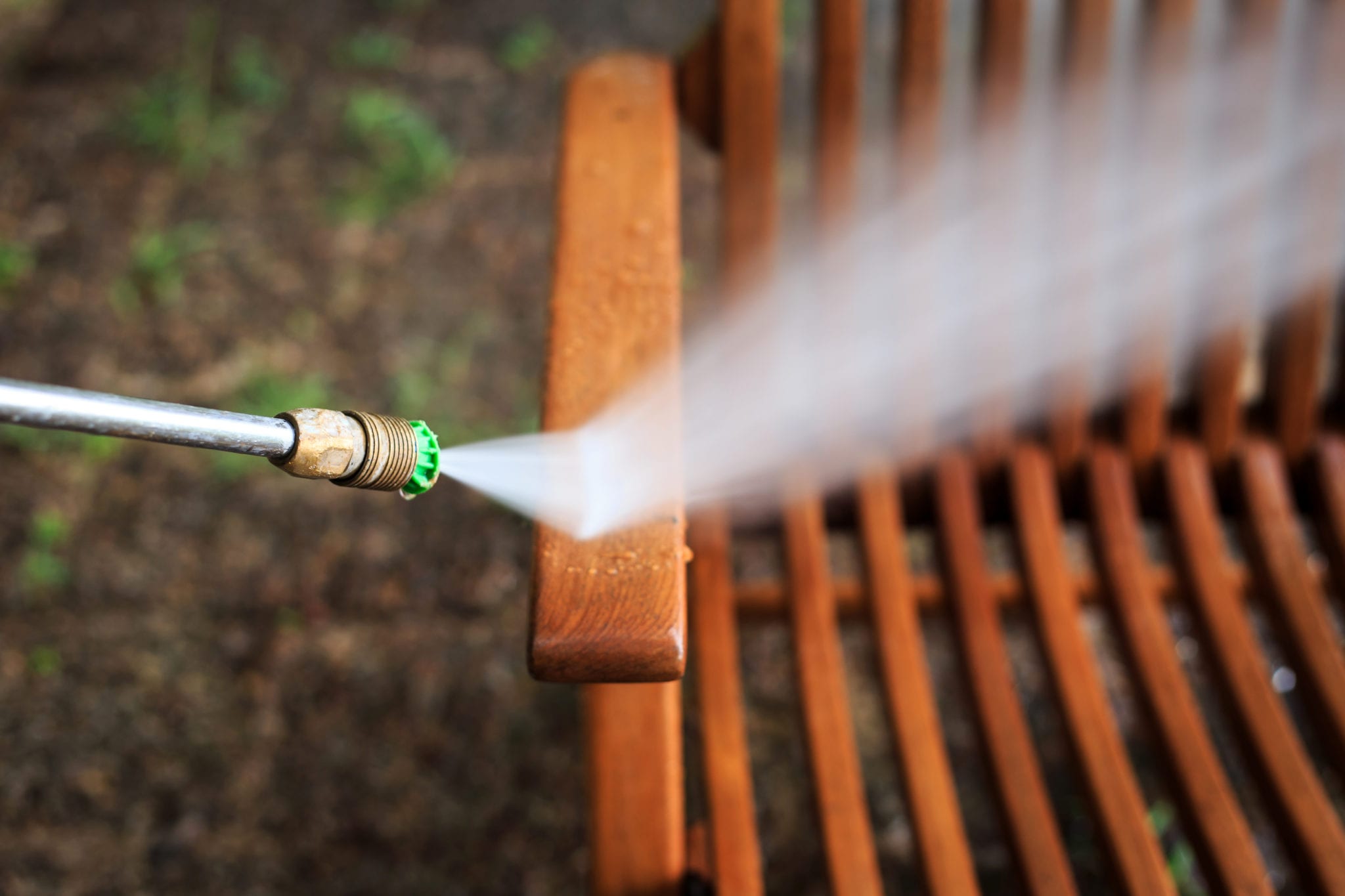 Wooden chair cleaning with high pressure water jet